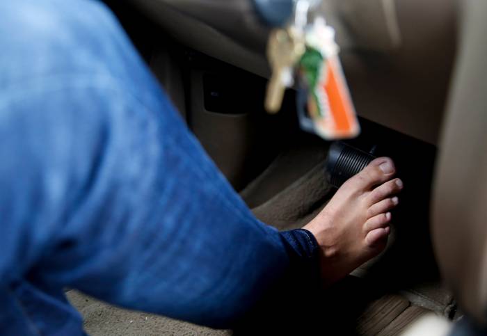 Why is it against the law to drive barefoot